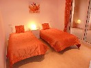 orange twin bedroom